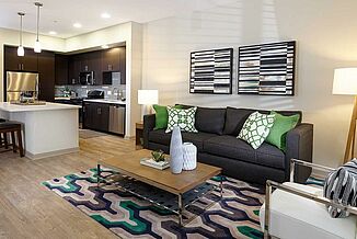 A living room and kitchen located in a residential home in the Avalon Bay Communities in Glendora. The facility utilized REGUPOL vibration and REGUFOAM vibration.